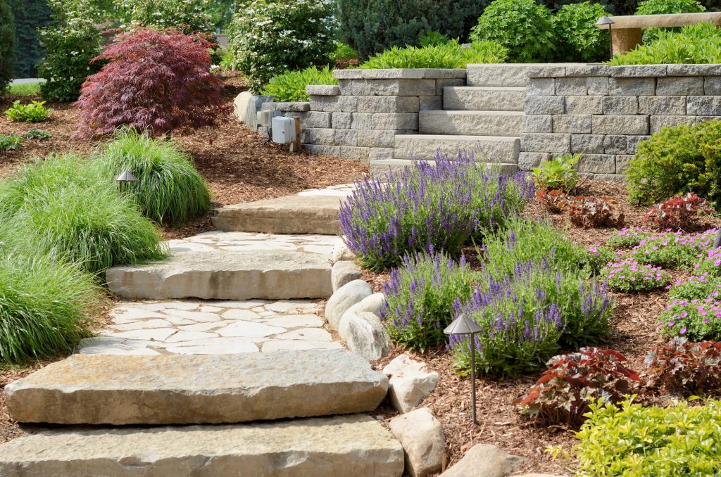 stone stairway leading up to retaining wall